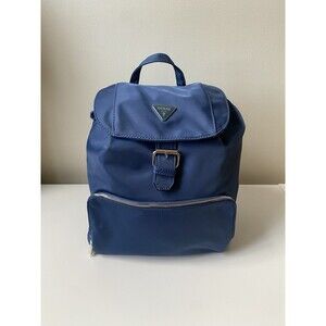 Guess Blue Jaxi Nylon Backpack with Black Adjustable Straps and Gold Accents